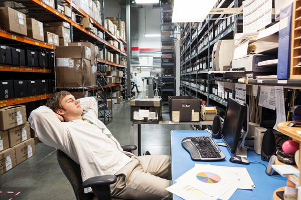 a-male-technician-relaxing-at-his-desk-in-the-part-2022-03-04-02-20-10-utc-1