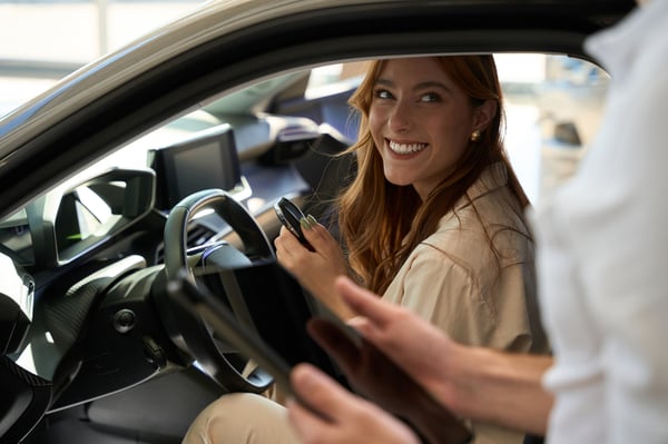 auto-dealership-customer-seated-in-motorcar-talkin-2022-11-23-00-45-04-utc