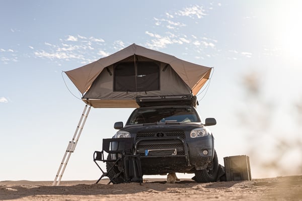 rooftop-tent-for-camping-on-the-roof-rack-of-an-of-2026-03-18-13-24-44-utc