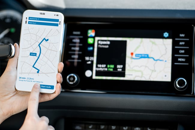 smart-phone-with-navigation-app-in-the-car-JKGK92M