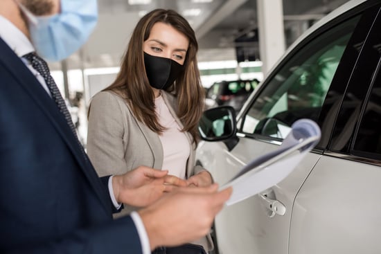 woman dealership customer in mask